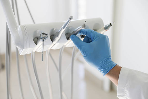Professional Tooth Extraction technician working in Harper Woods, MI